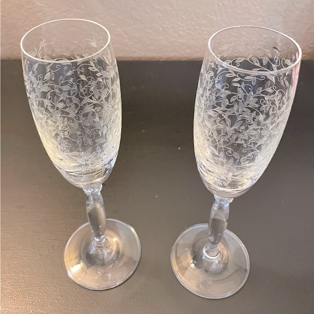 Pier 1 Eliza beautifully etched champagne glasses.